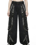 Close-up of buckle strap and D-ring hardware on denim cargo pants
