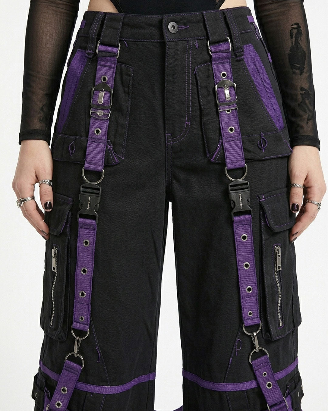 Close-up of buckle strap and pocket detail on gothic cargo pants