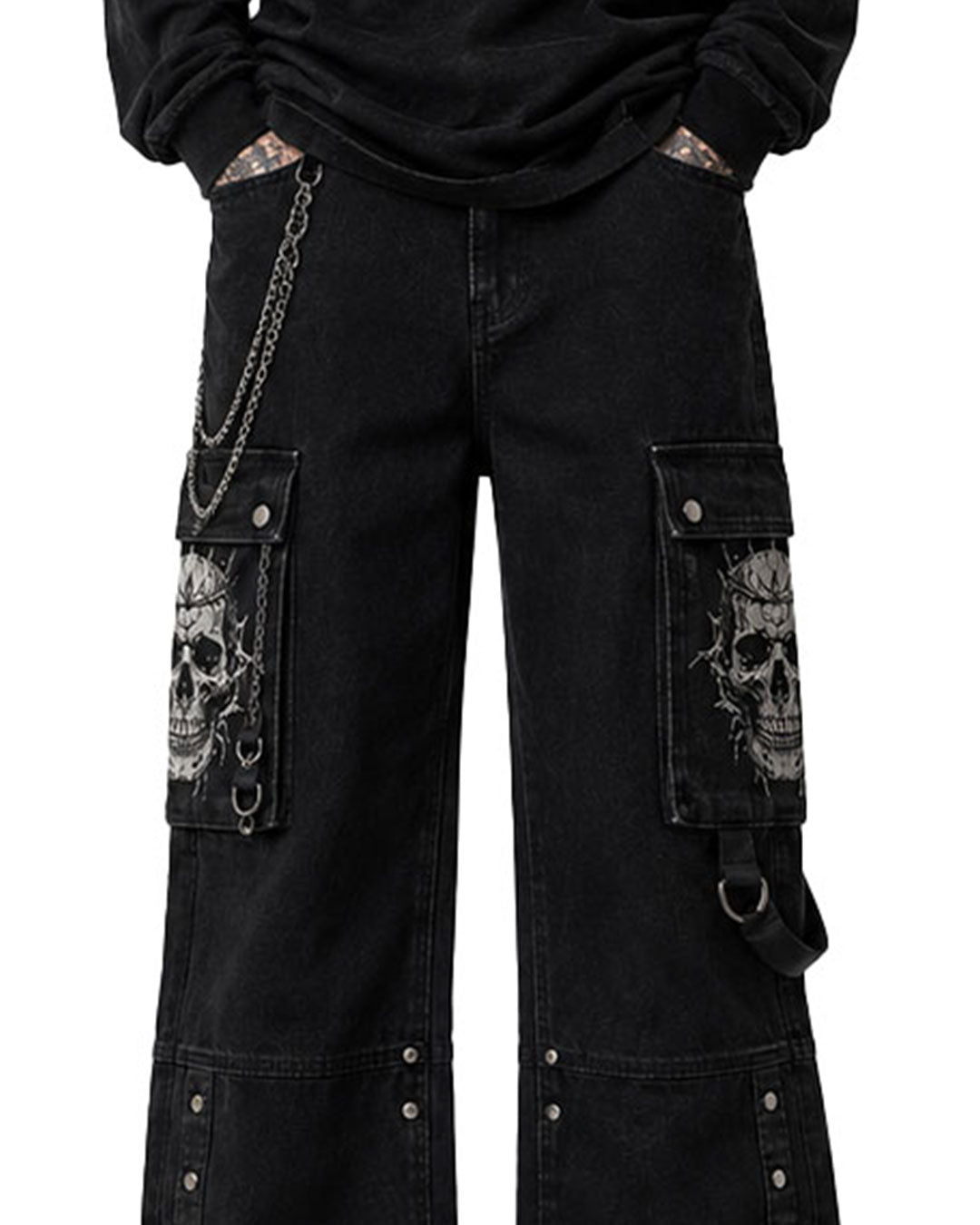 Close-up of baggy men black jeans cargo pockets with skull design and chain detailing