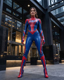 Model standing in a wide power pose wearing a red and blue faux leather superhero cosplay catsuit with matching gloves and thigh-high boots, photographed outdoors near a glass office building at dusk.