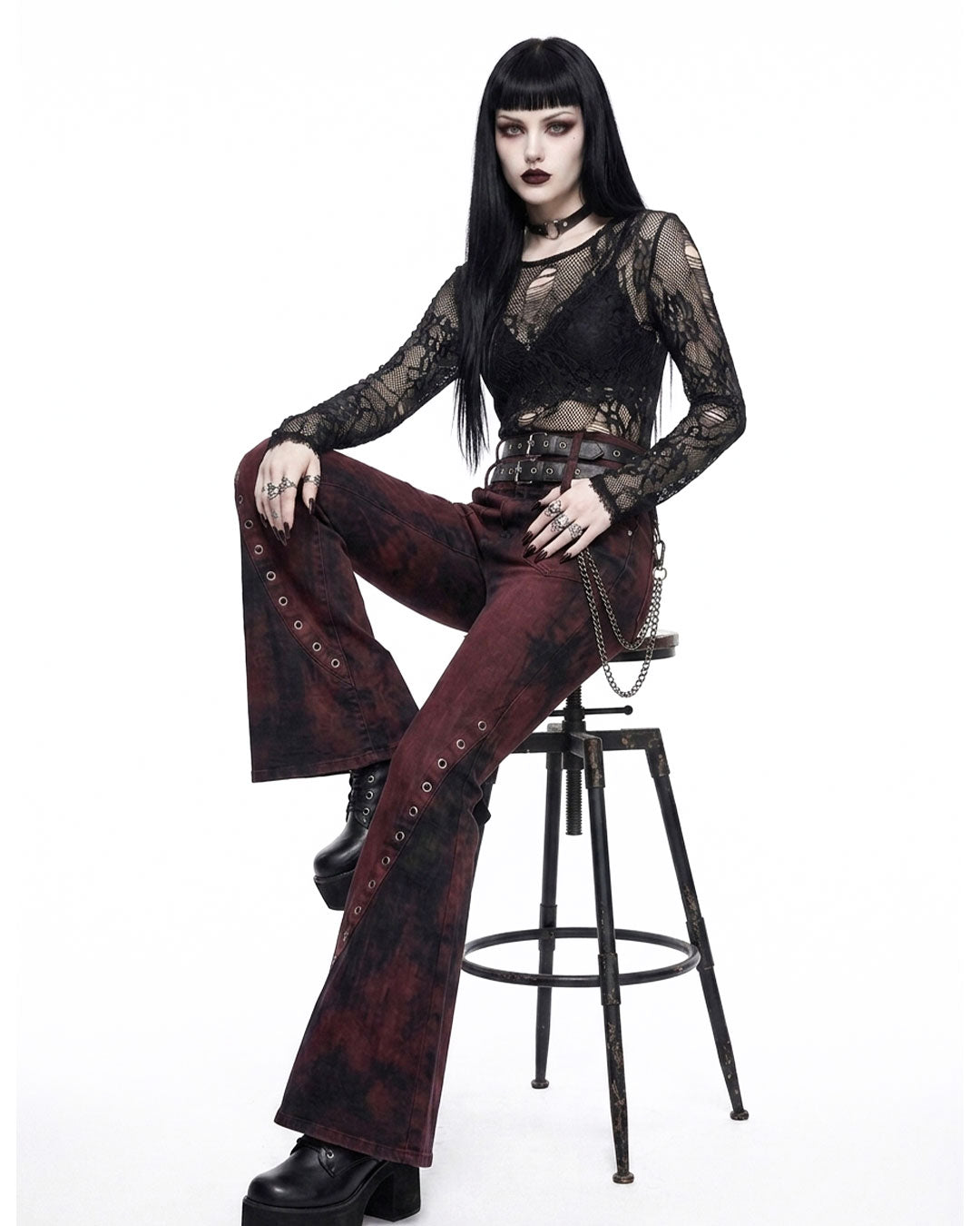 Flare pants women gothic bell bottom jeans sitting pose on model