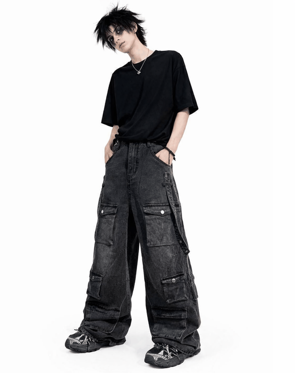 Black baggy cargo jeans for men with oversized fit, washed black denim look, and multiple utility flap pockets in streetwear style.