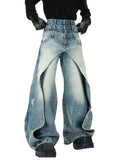 Layered distressed blue jeans with wide-leg silhouette and rugged urban style