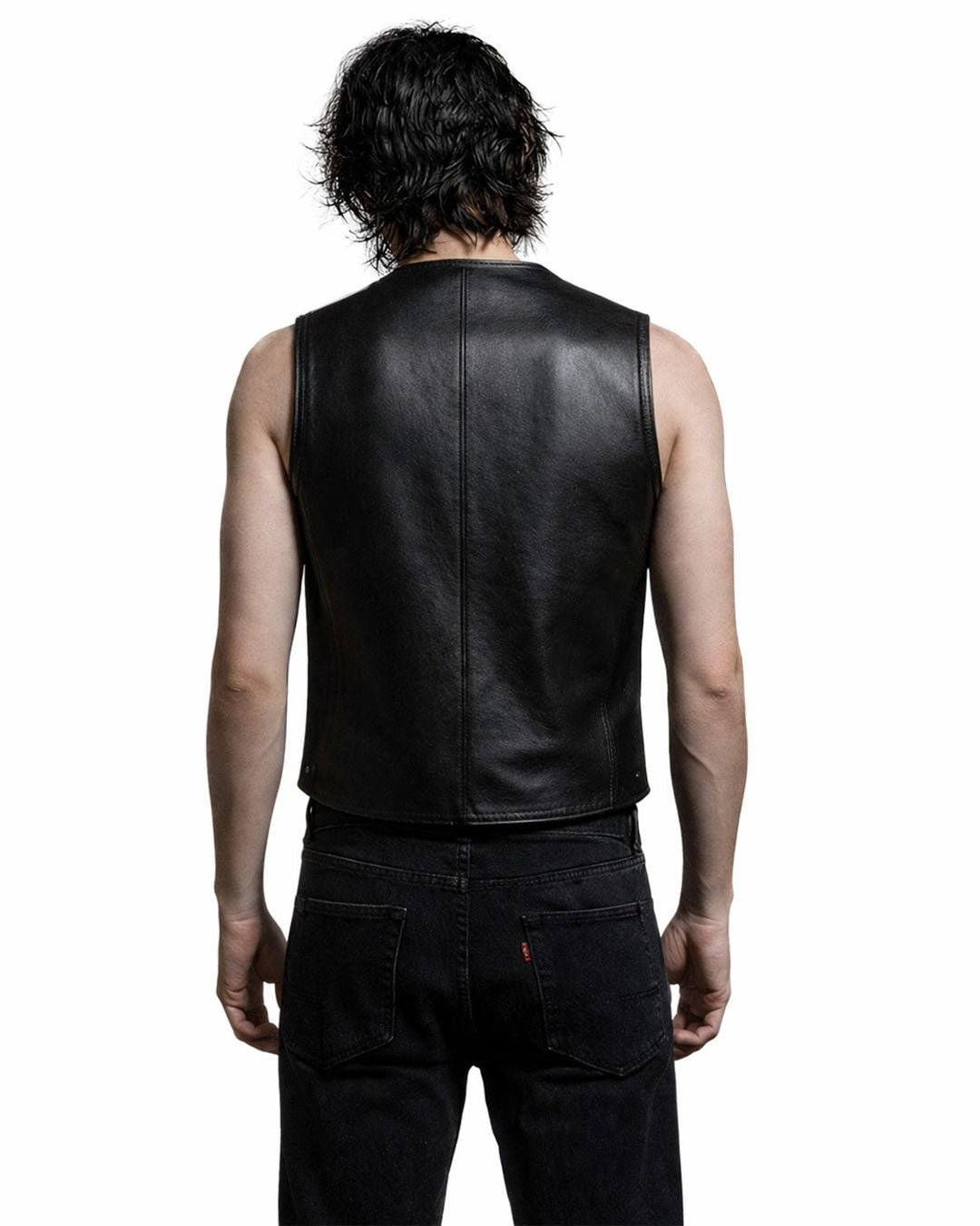 Men's edgy biker style studded black faux leather vest with gothic embroidery and cross detailing