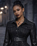 Close-up of spike shoulder studs and metal accents on women's punk leather jacket
