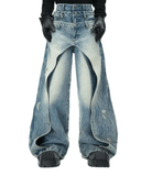 Layered distressed blue jeans with wide-leg fit and rugged layered panels in urban streetwear style