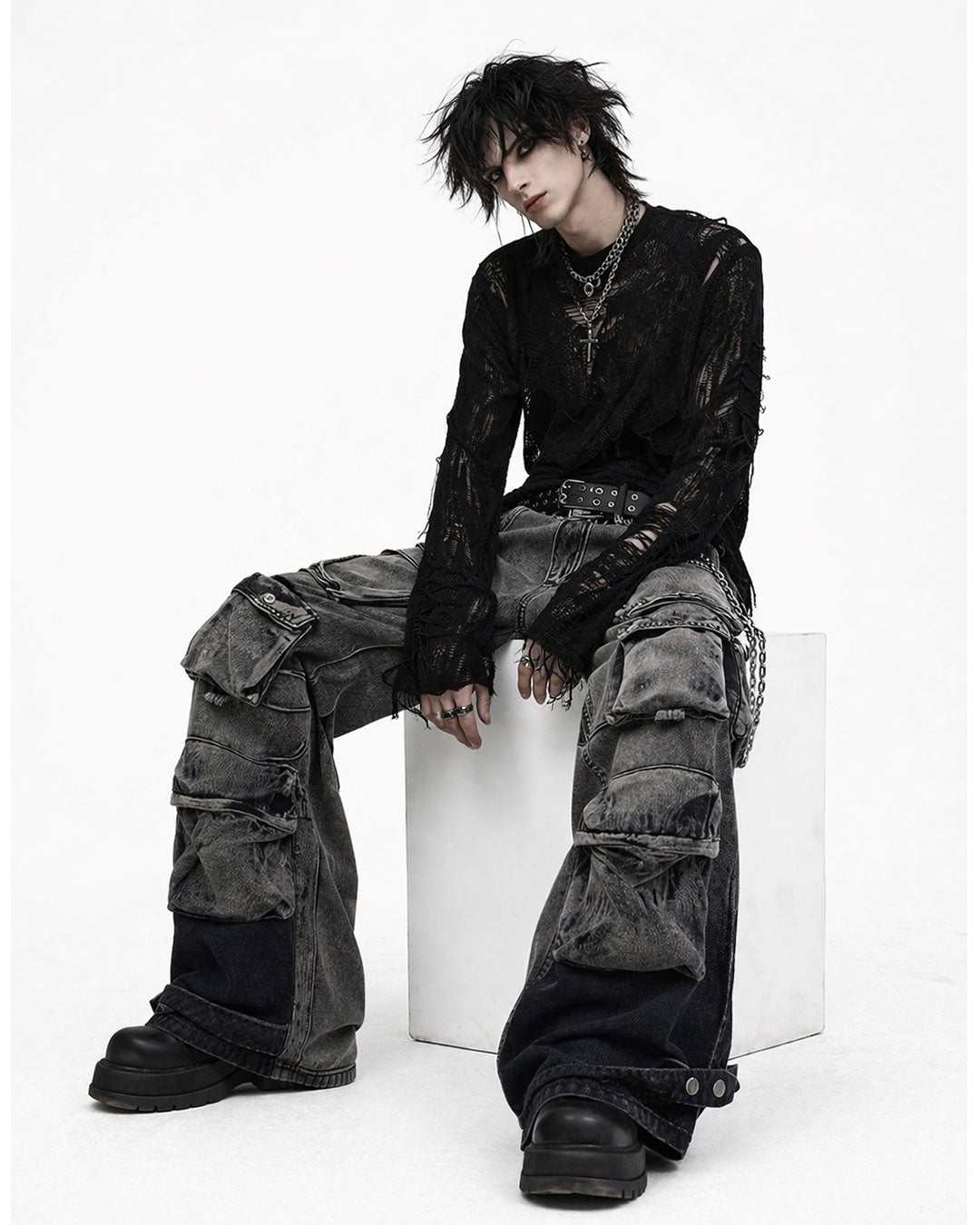 Mens wrangler cargo jeans in washed grey-black denim with baggy wide-leg fit and oversized utility pockets shown in front and back view.