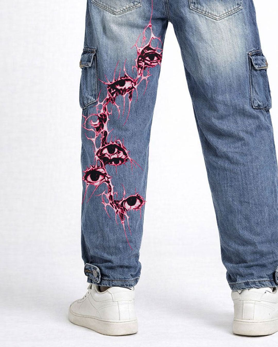 Side close-up of women's light blue baggy cargo jeans